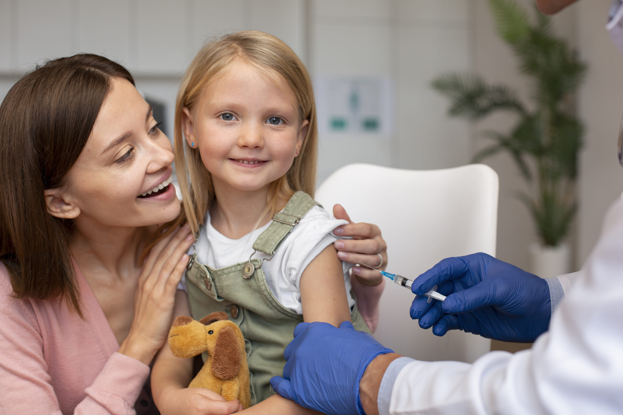 young-mother-with-her-daughter-pediatrician-vaccine